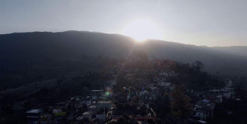 Hill village at sunrise